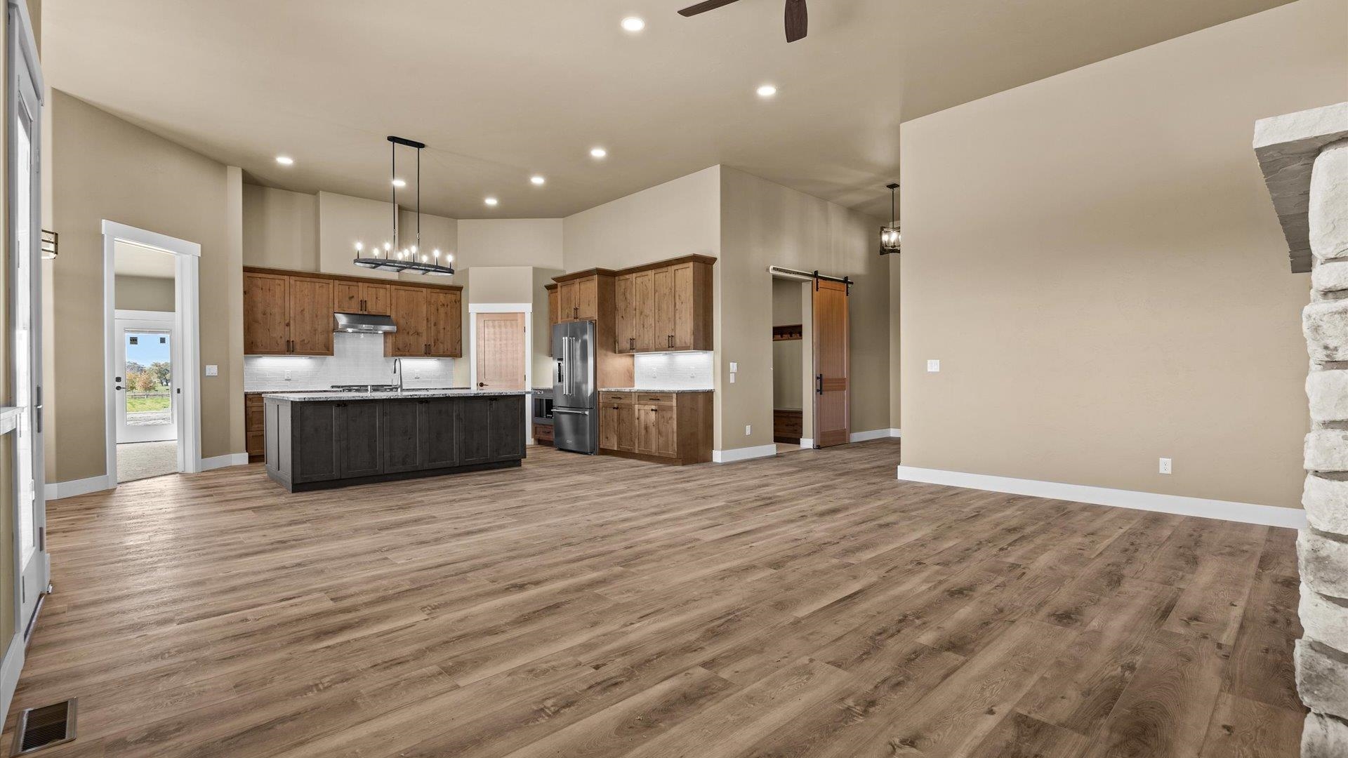 1193 22 1/2 Road Grand Junction, CO 81505 - Photo 6 of 28 a view of a kitchen with a sink and a refrigerator