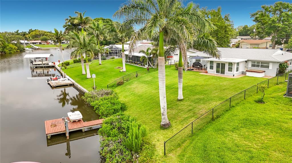 508 Shore Drive Largo, FL 33771 - Photo 27 of 31 a view of a house with a backyard