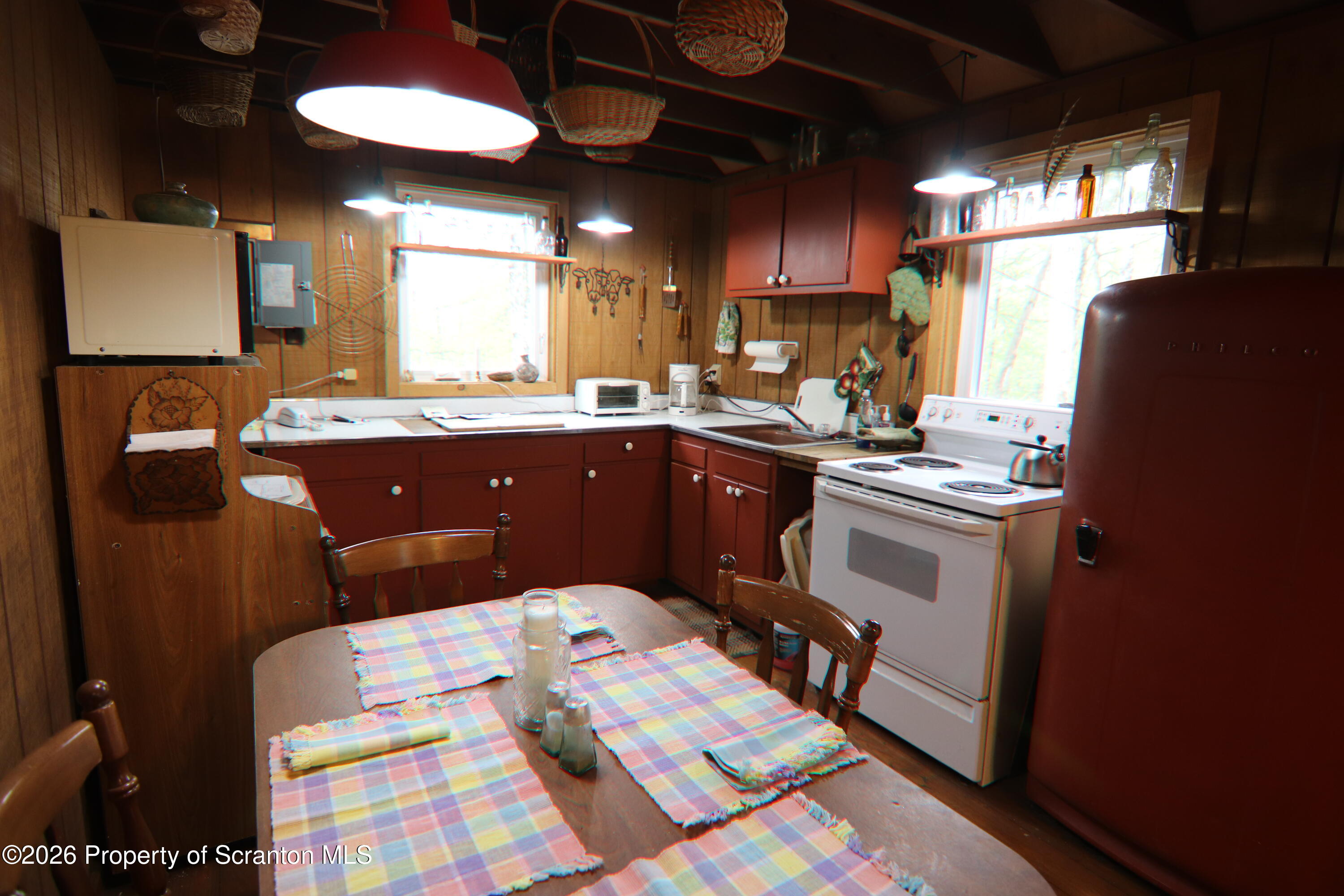 300 Pennsworth Hill Road Meshoppen, PA 18630 - Photo 12 of 38 a kitchen with a sink appliances and cabinets