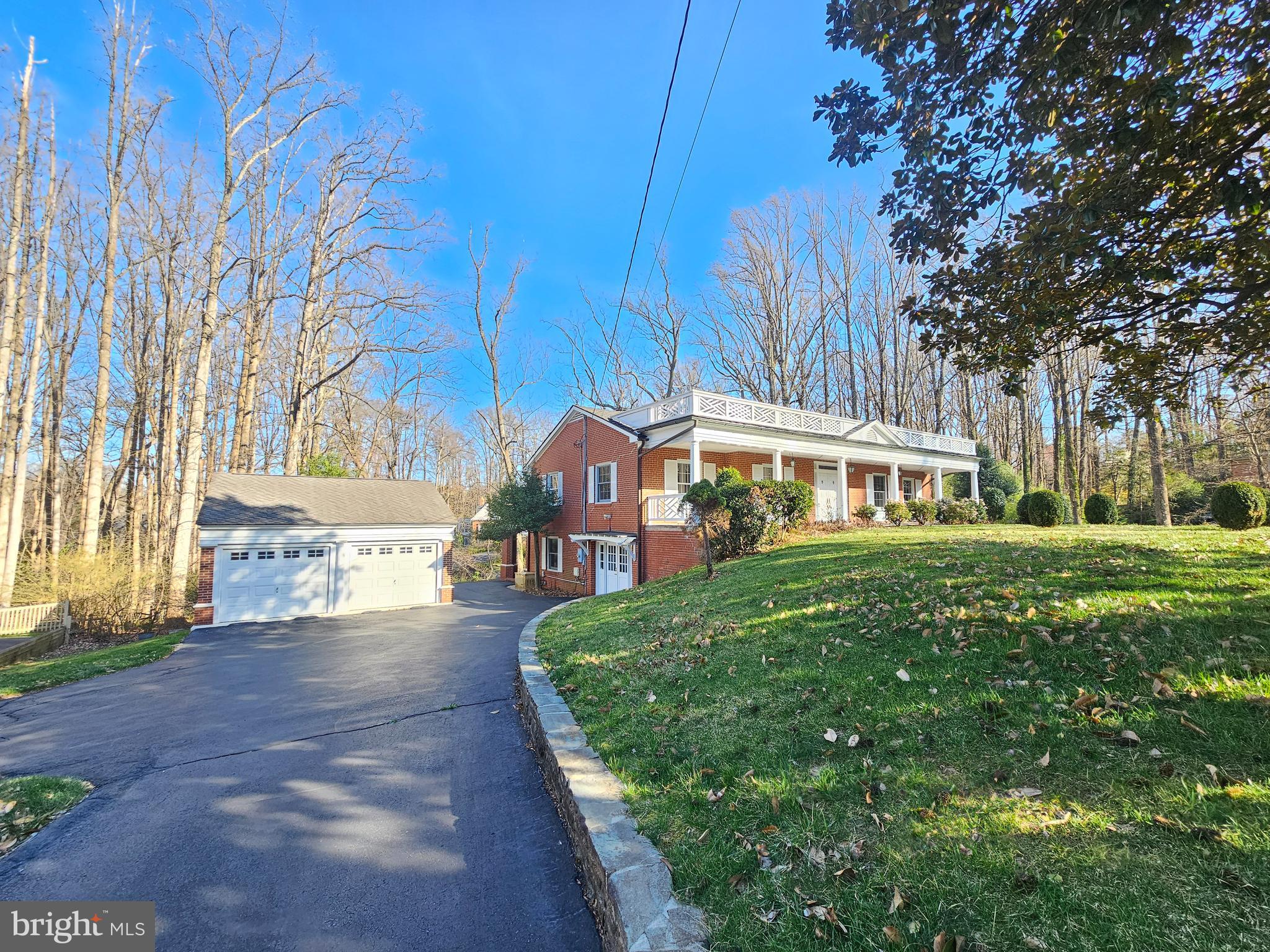 851 Canal Drive McLean, VA 22102 - Photo 45 of 50 a front view of a house with garden