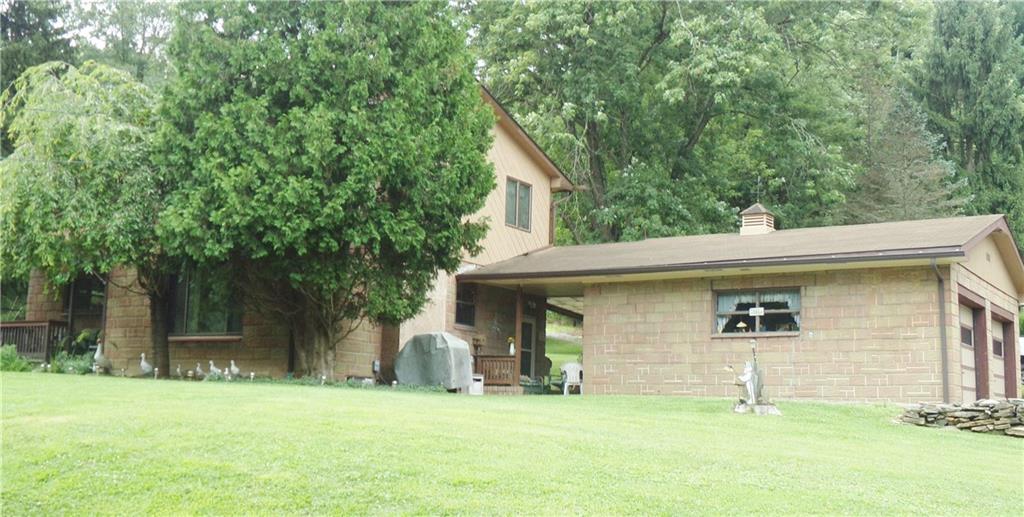 111 Cherry Valley Road Saxonburg, PA 16056 - Photo 4 of 20 Breezeway and heated two car garage