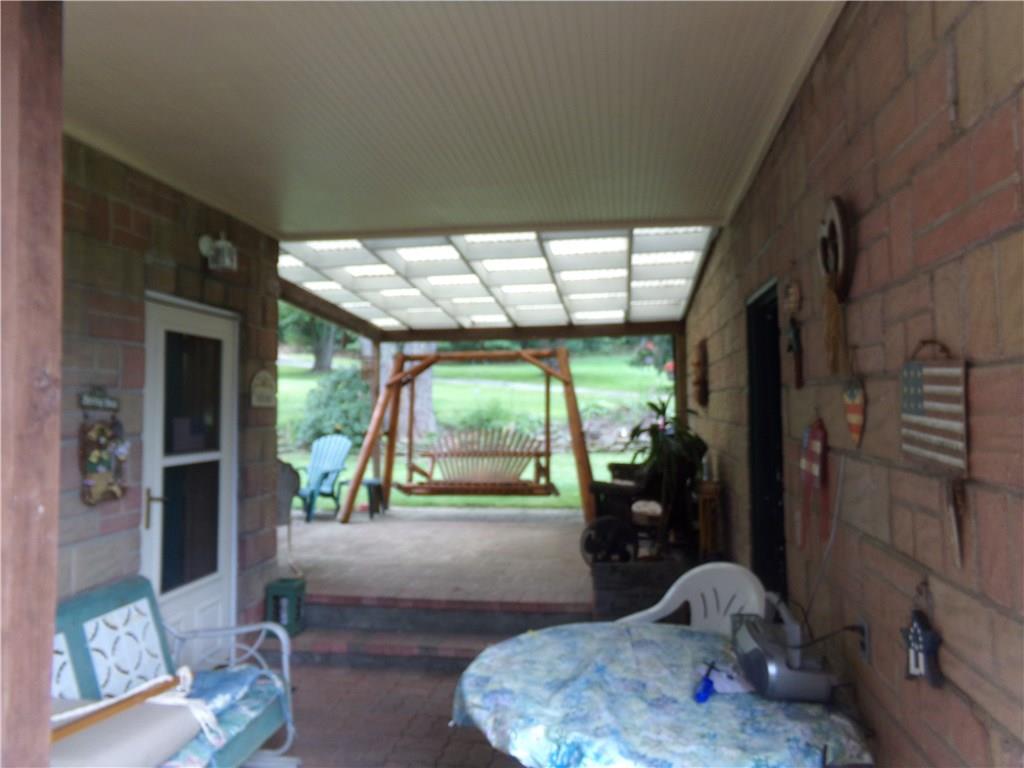 111 Cherry Valley Road Saxonburg, PA 16056 - Photo 5 of 20 Breezeway and back patio