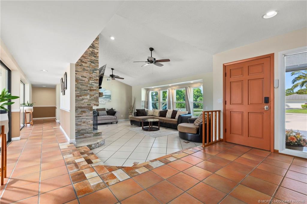 4599 Southeast Halston Court Stuart, FL 34997 - Photo 10 of 65 a lobby with furniture and window