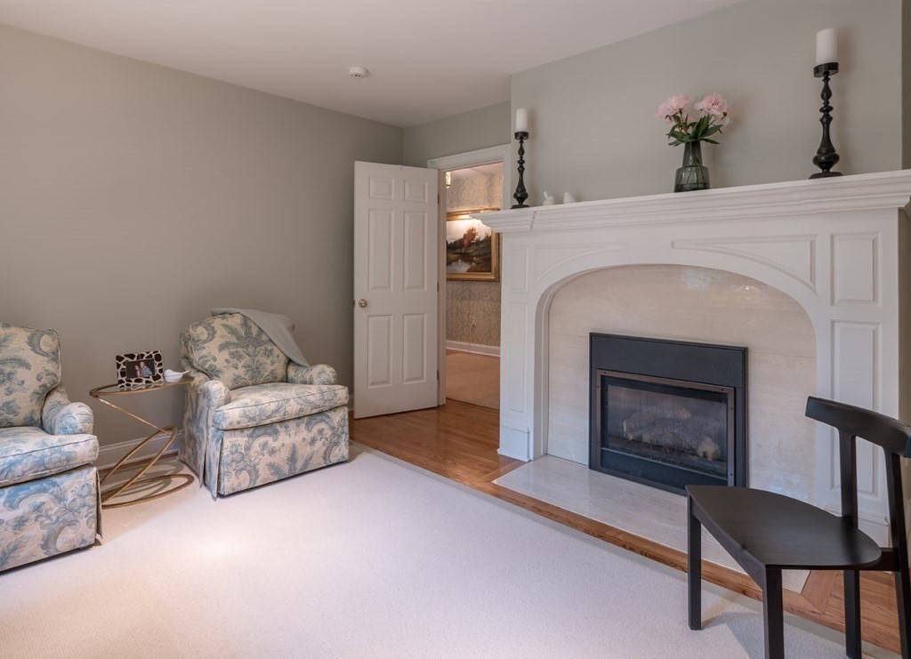 29 Whiting Road Wellesley, MA 02481 - Photo 17 of 36 a living room with furniture and a fireplace