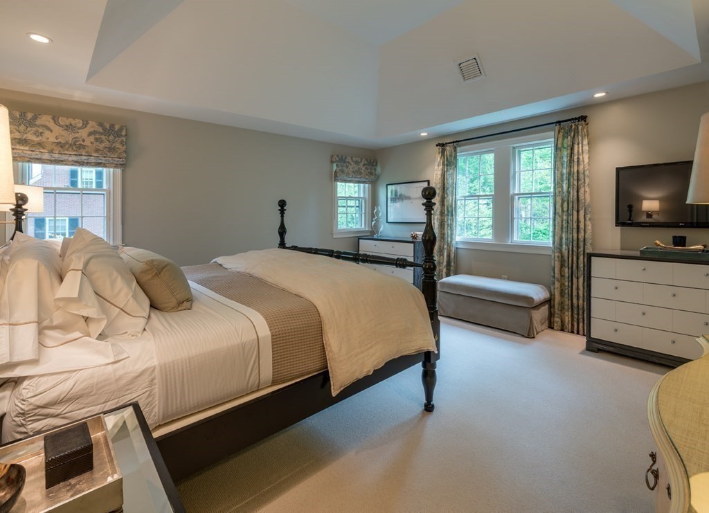 29 Whiting Road Wellesley, MA 02481 - Photo 18 of 36 a bedroom with a bed and wooden floor