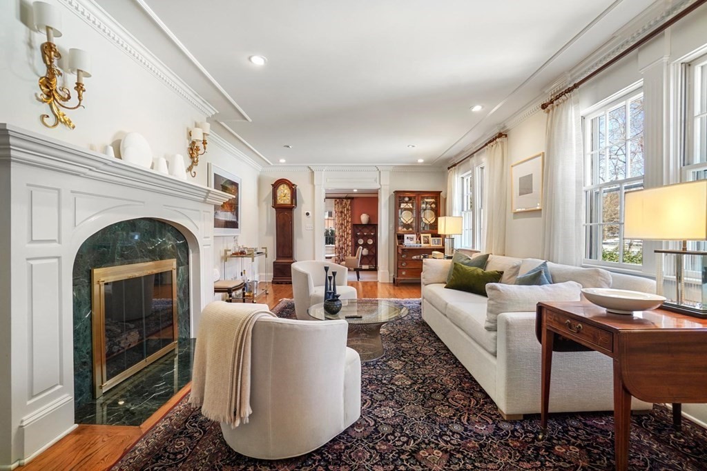 29 Whiting Road Wellesley, MA 02481 - Photo 2 of 36 a living room with furniture a fireplace and a large window