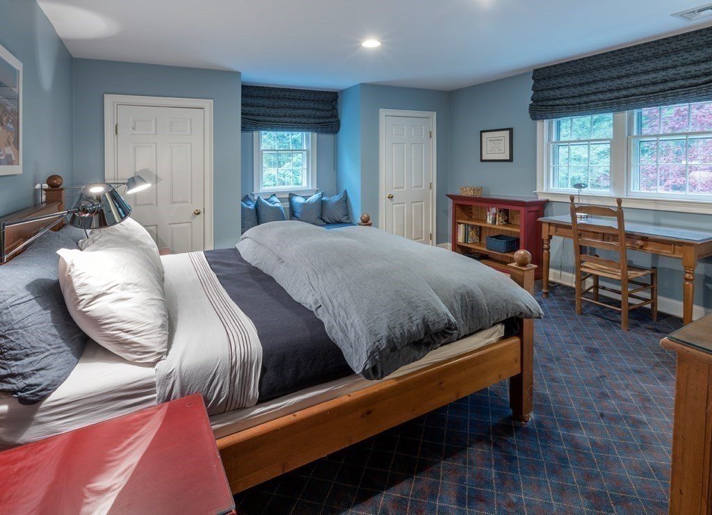 29 Whiting Road Wellesley, MA 02481 - Photo 24 of 36 a bedroom with a bed and a large window