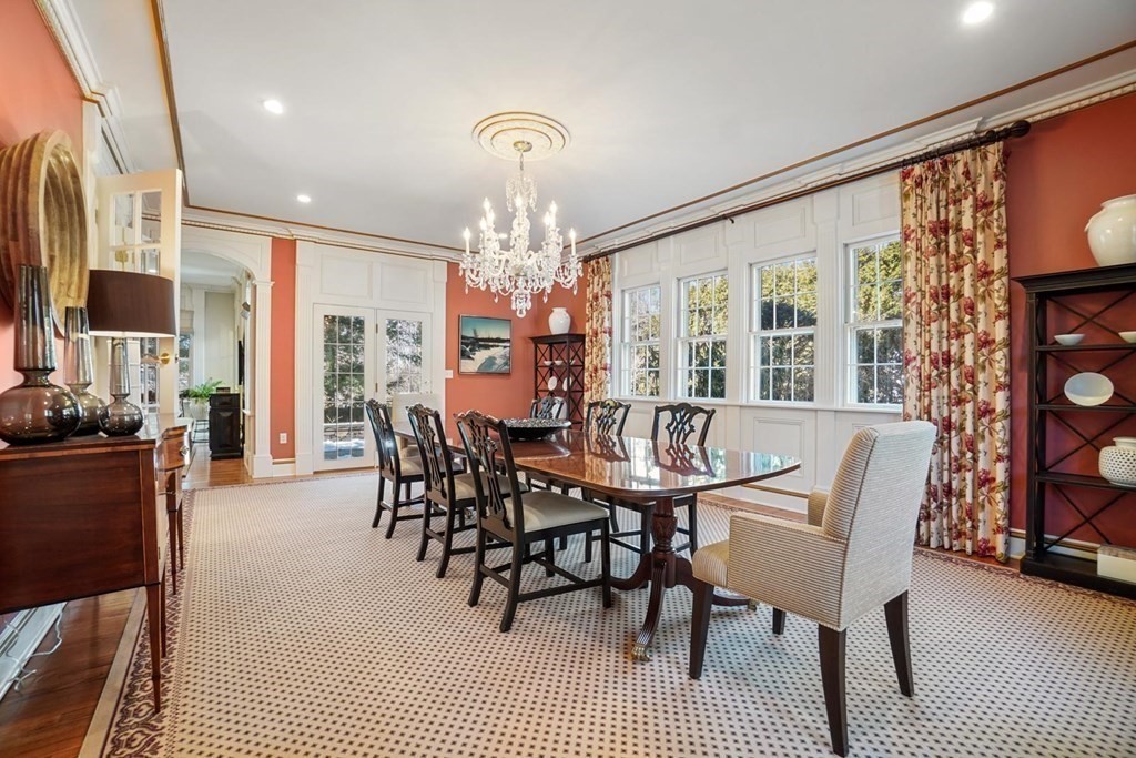 29 Whiting Road Wellesley, MA 02481 - Photo 4 of 36 a dining room with furniture a chandelier and window