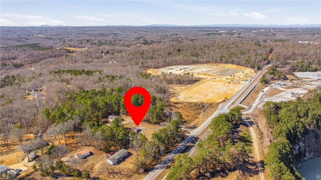 3004 Candler Road Gainesville, GA 30507 - Photo 12 of 27 an aerial view of a house with a swimming pool