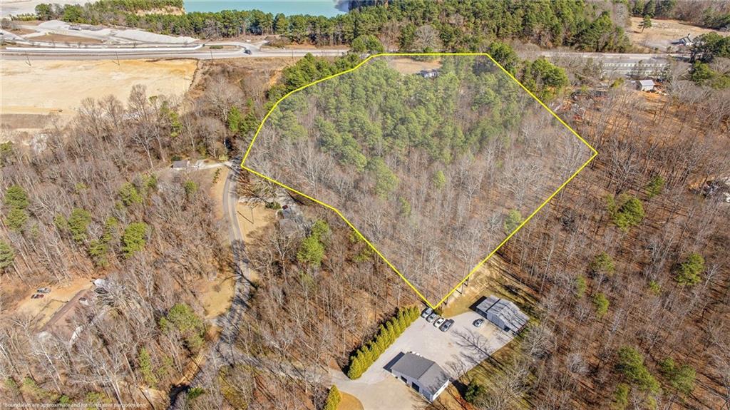 3004 Candler Road Gainesville, GA 30507 - Photo 14 of 27 a view of a lake with outdoor space