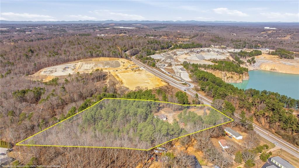 3004 Candler Road Gainesville, GA 30507 - Photo 2 of 27 an aerial view of residential houses with outdoor space