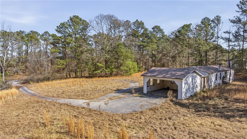 3004 Candler Road Gainesville, GA 30507 - Photo 27 of 27 a view of a backyard with trees