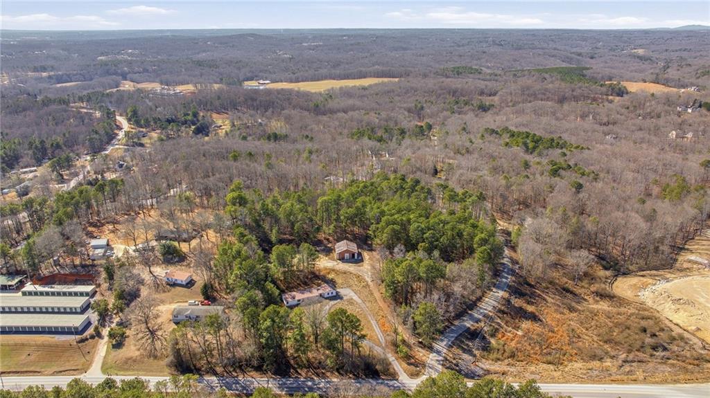 3004 Candler Road Gainesville, GA 30507 - Photo 3 of 27 a view of a dry yard with trees