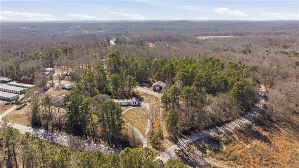 3004 Candler Road Gainesville, GA 30507 - Photo 9 of 27 a view of a city with lush green forest