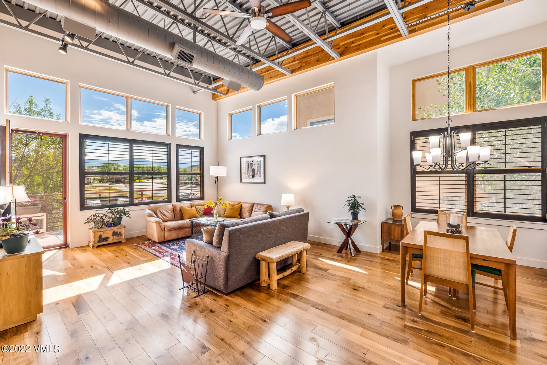 1185 Capitol Street, Unit 203 Eagle, CO 81631 - Photo 13 of 22 a living room with furniture and a large window