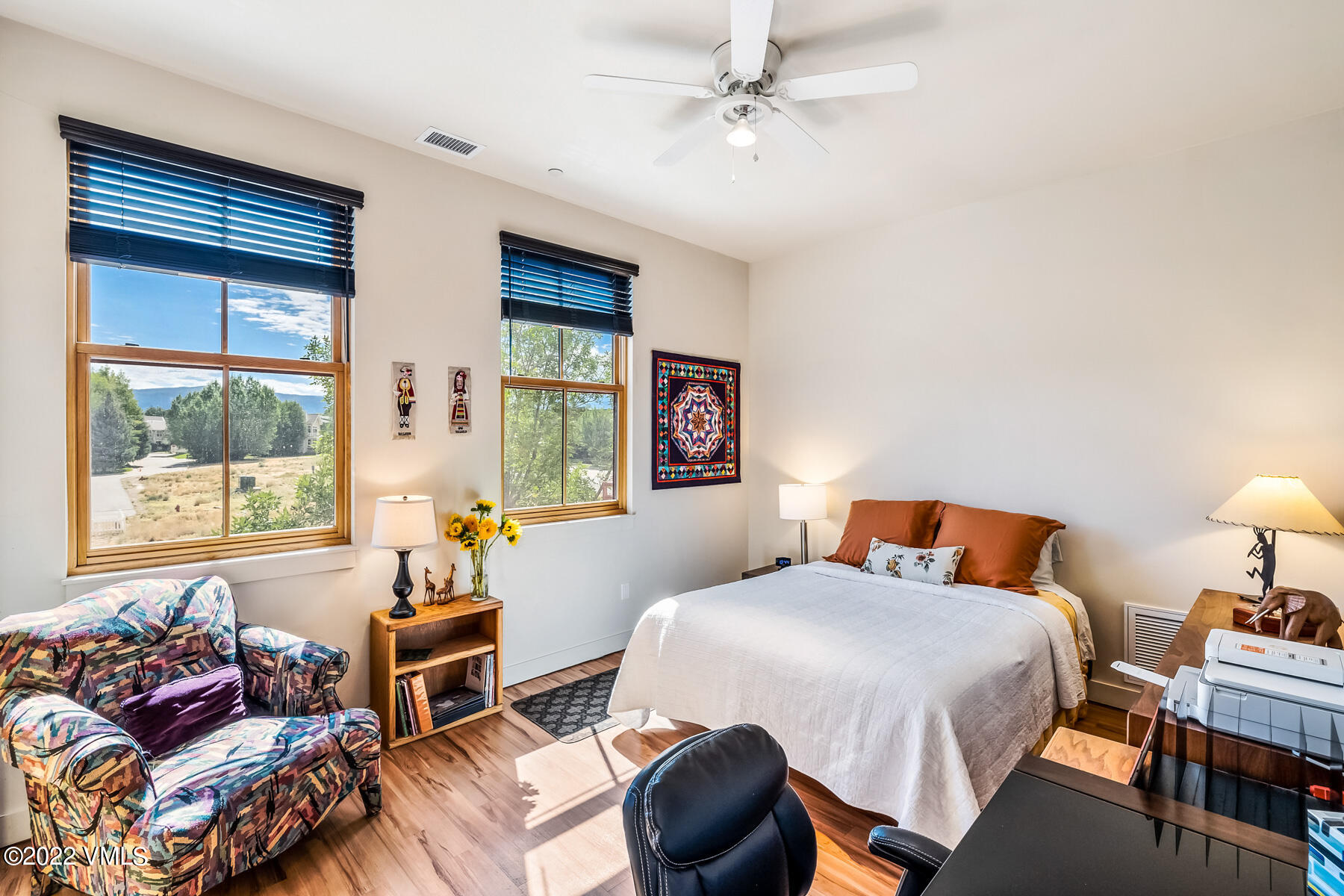 1185 Capitol Street, Unit 203 Eagle, CO 81631 - Photo 16 of 22 a bedroom with a bed and a couch next to a window
