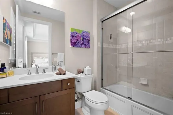 a view of a storage and utility room with closet