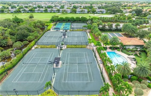 a view of a swimming pool with a patio