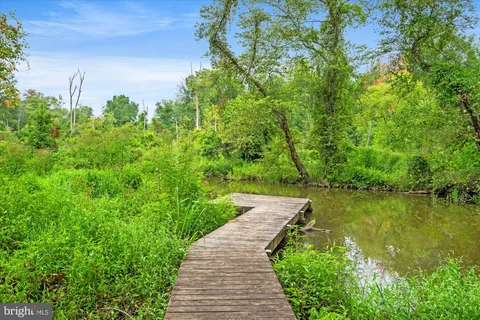 a view of a lake with a building in the background