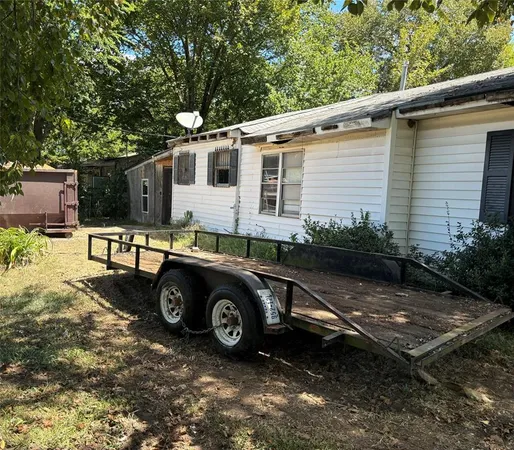 a car parked in front of a house