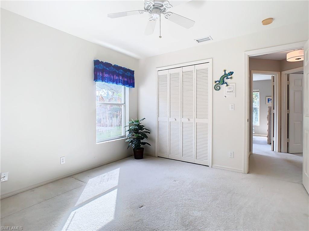 147 Plantation Circle Naples, FL 34104 - Photo 18 of 32 a view of an empty room