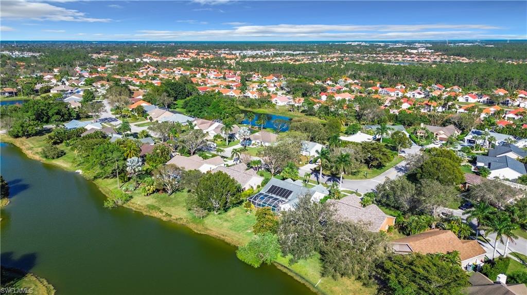 147 Plantation Circle Naples, FL 34104 - Photo 29 of 32 a view of city and ocean