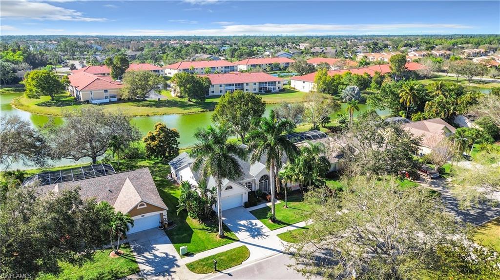 147 Plantation Circle Naples, FL 34104 - Photo 31 of 32 a view of a city with lots of trees