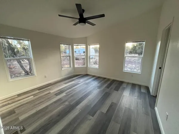 a view of an empty room and window