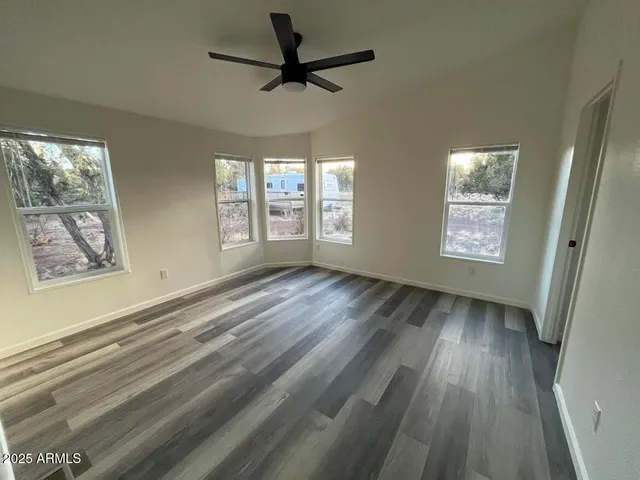 a view of an empty room and window