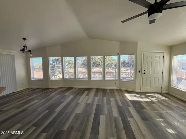 a view of an empty room and window