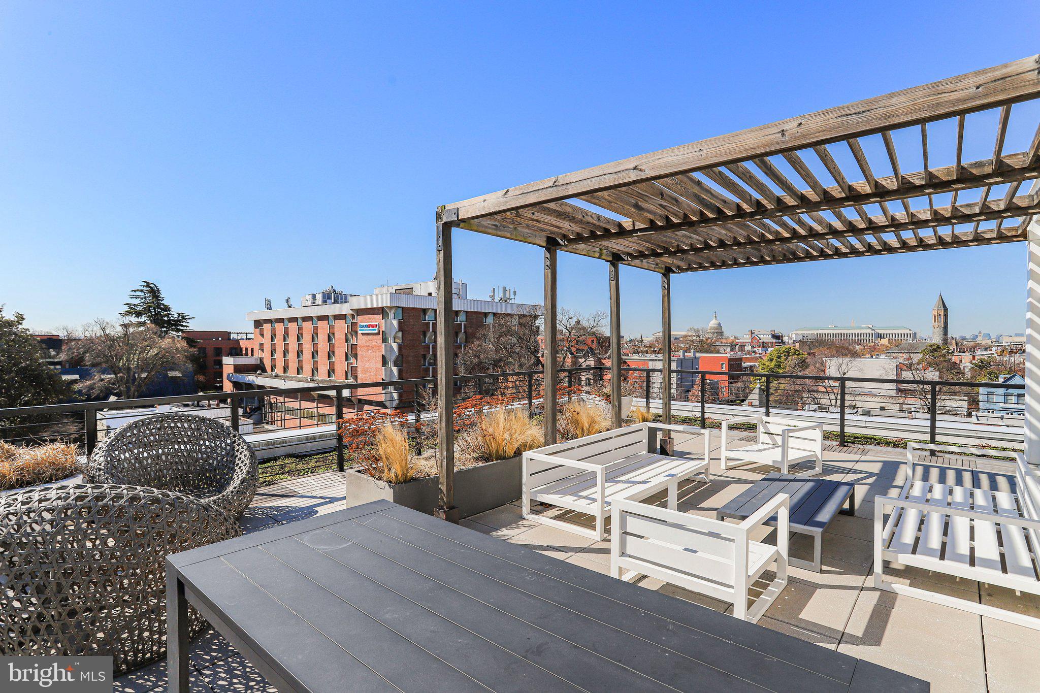 300 8th Street Northeast, Unit 404 Washington, DC 20002 - Photo 18 of 22 Grills, seating on Roofdeck