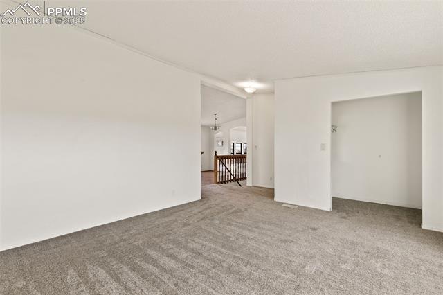 5915 West Condor Road Peyton, CO 80831 - Photo 16 of 50 Living room with new carpet