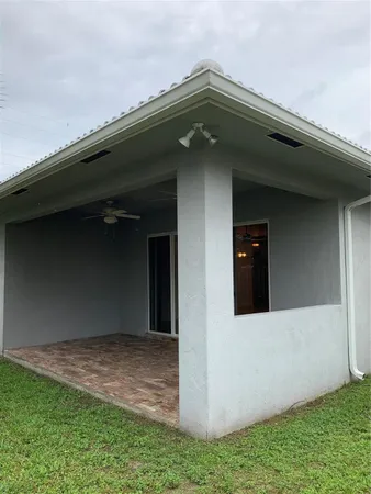 an entrance to house with yard