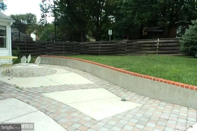 a view of backyard with green space