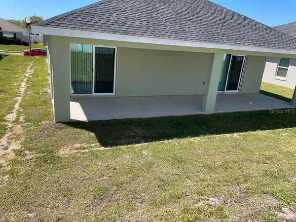 a view of a backyard with plants