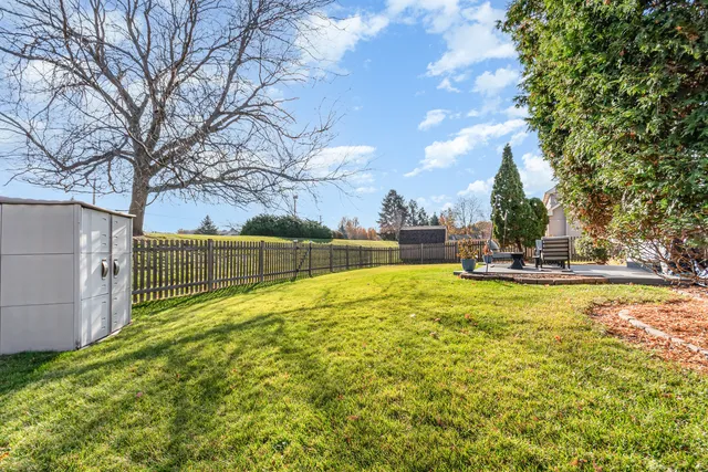 a view of a backyard with a garden