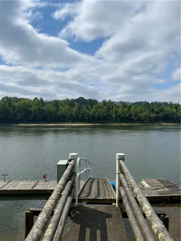 a view of a lake with mountain in the background