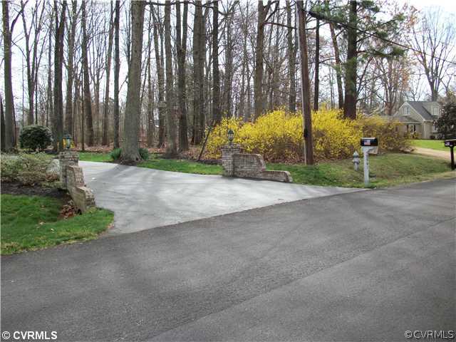 2541 Radstock Road Midlothian, VA 23113 - Photo 12 of 12 a view of backyard with palm trees