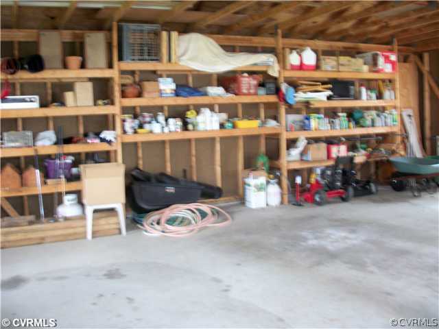 2541 Radstock Road Midlothian, VA 23113 - Photo 9 of 12 a view of a room with shelves
