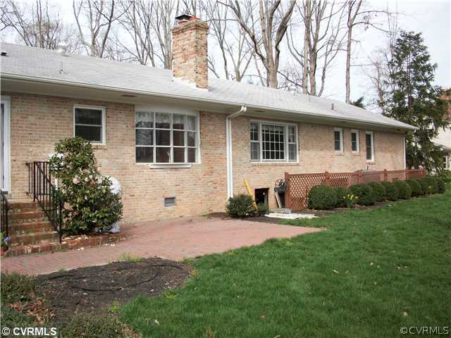 2541 Radstock Road Midlothian, VA 23113 - Photo 10 of 12 a front view of a house with a yard and porch
