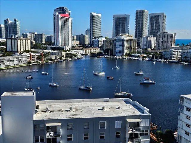 a view of a city with tall buildings