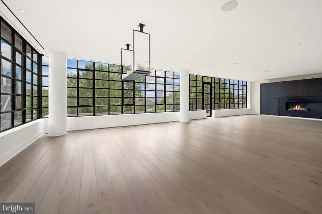 a view of livingroom with furniture and floor to ceiling window