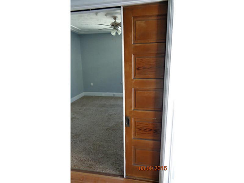 321 Federal Street Butler, PA 16001 - Photo 3 of 17 Living Room. Pocket doors leading into the living room
