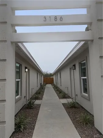 a view of a back yard of the house
