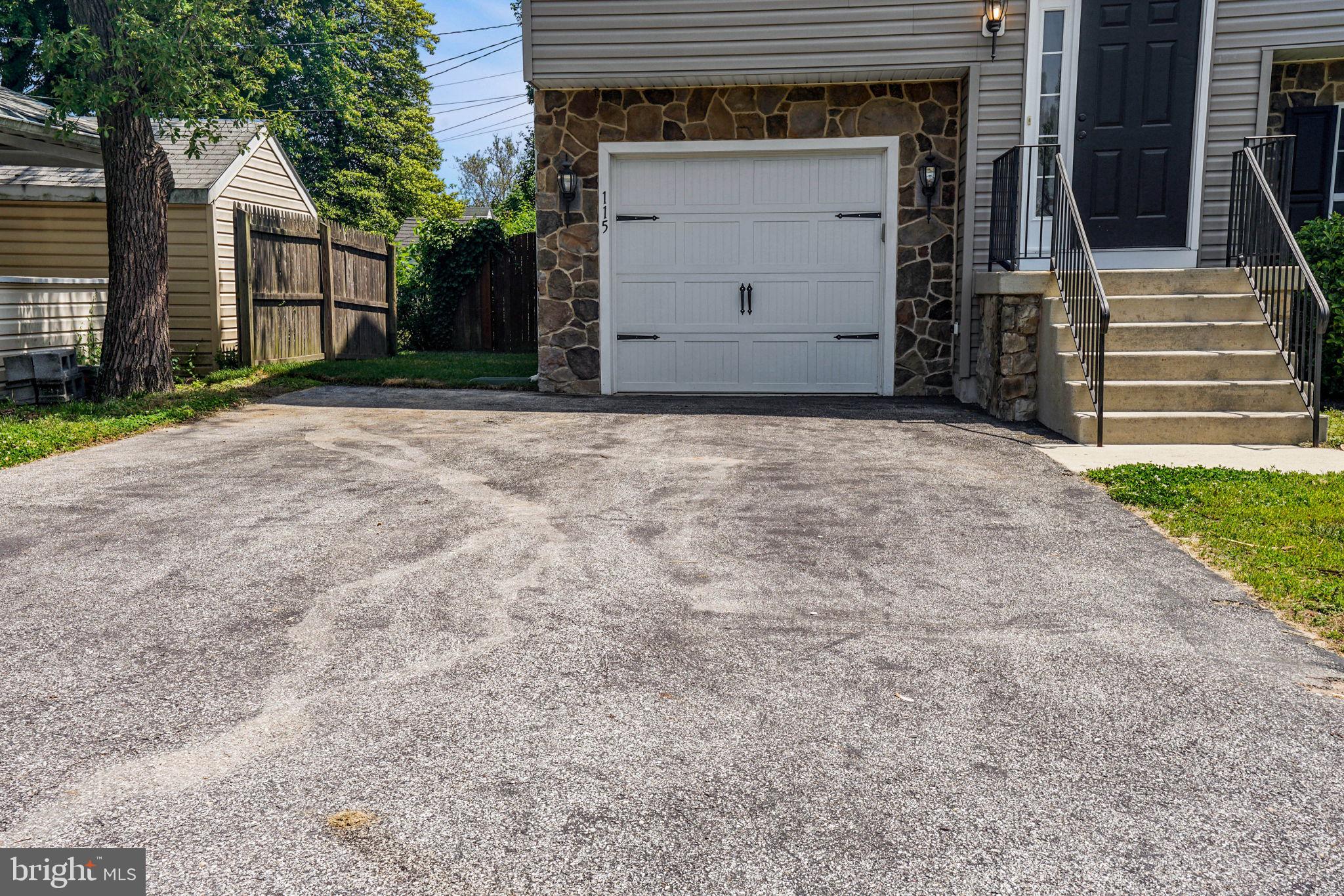 115 Meadow Road Pasadena, MD 21122 - Photo 3 of 77 Garage and Driveway