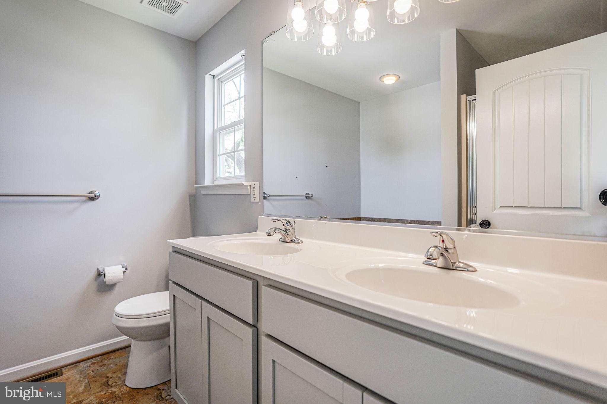 115 Meadow Road Pasadena, MD 21122 - Photo 32 of 77 Primary Bath New Vanity & Lights