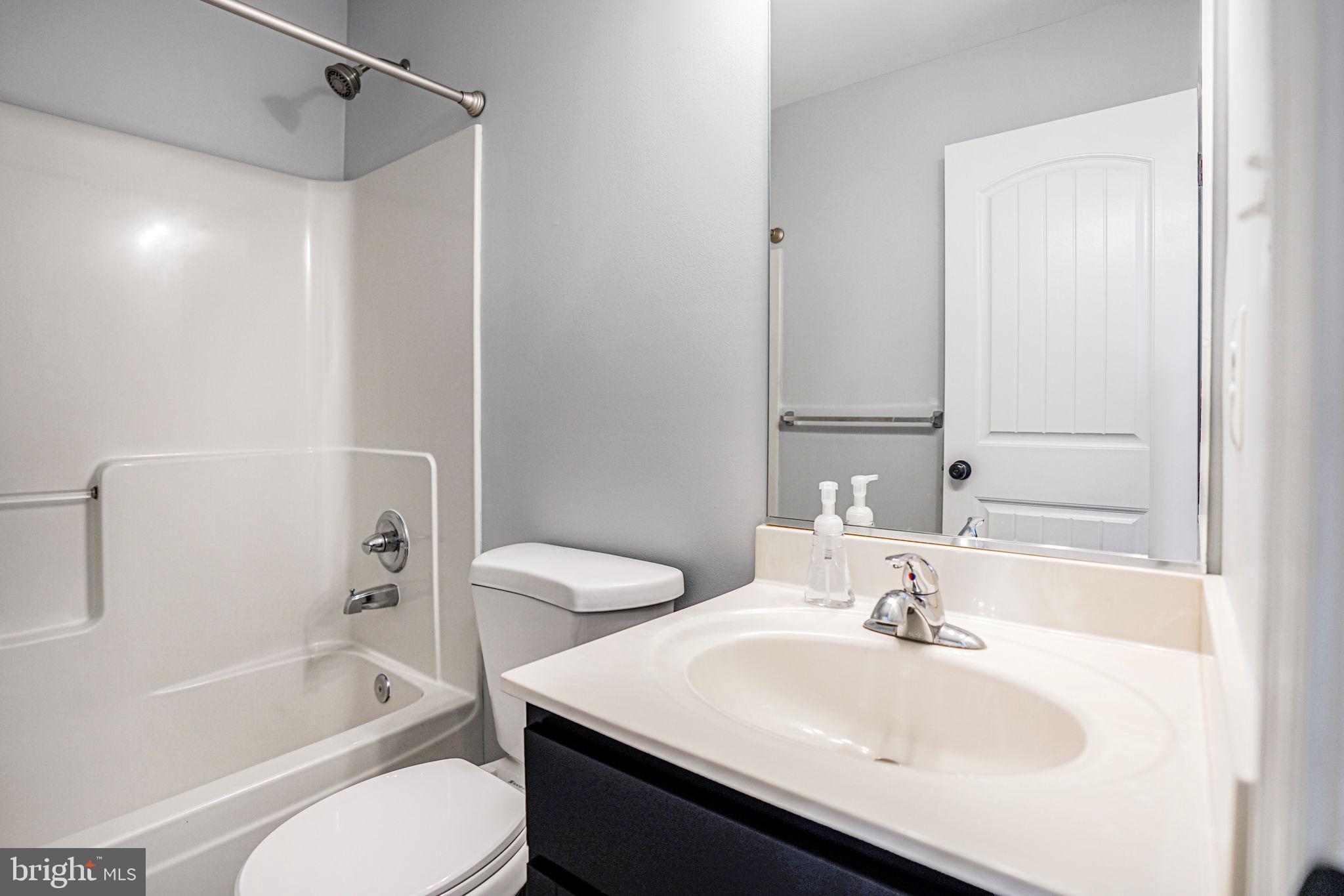 115 Meadow Road Pasadena, MD 21122 - Photo 49 of 77 Upper level Hall Bath