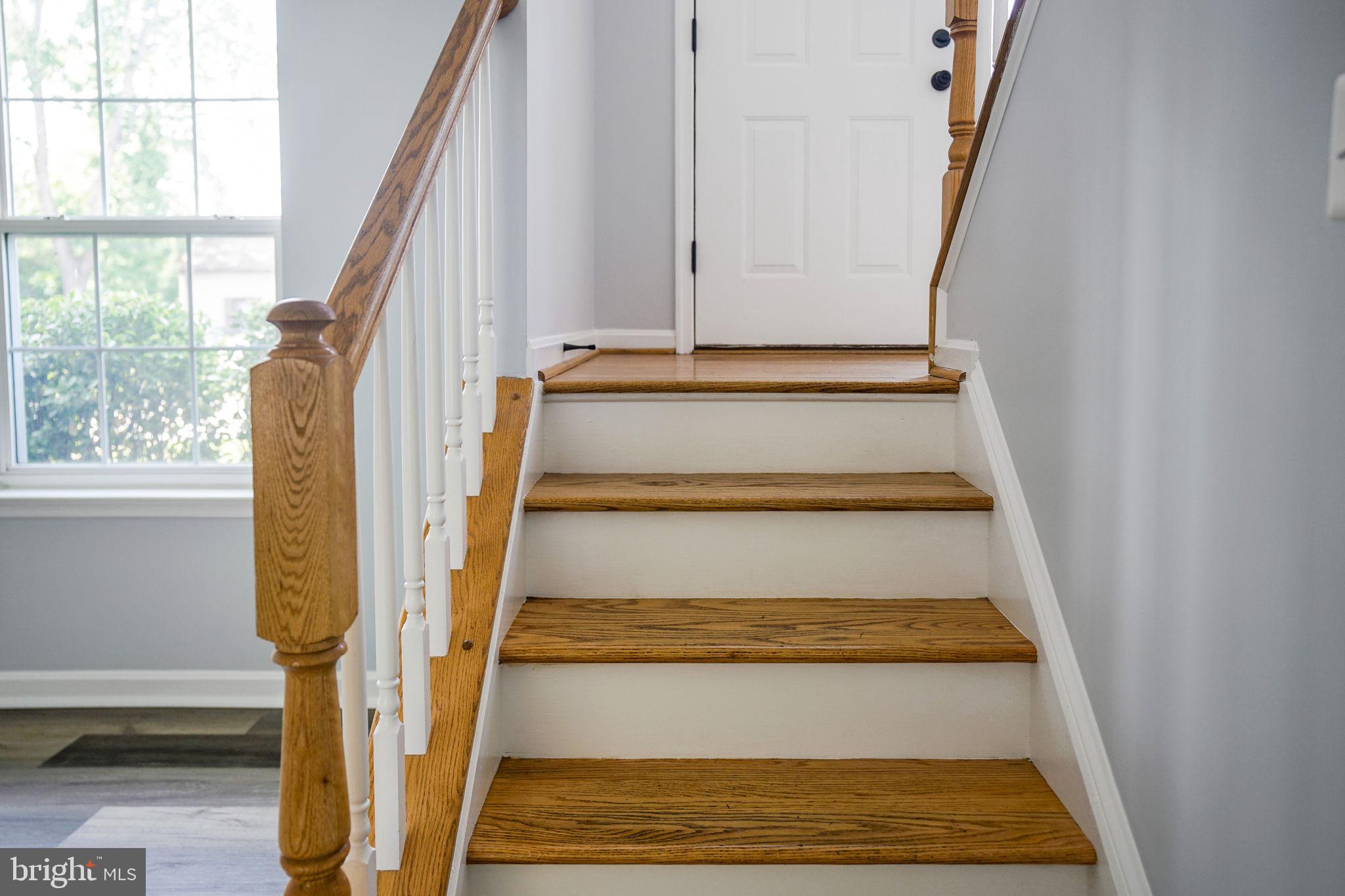 115 Meadow Road Pasadena, MD 21122 - Photo 51 of 77 Hardwood stairs to the Lower Level