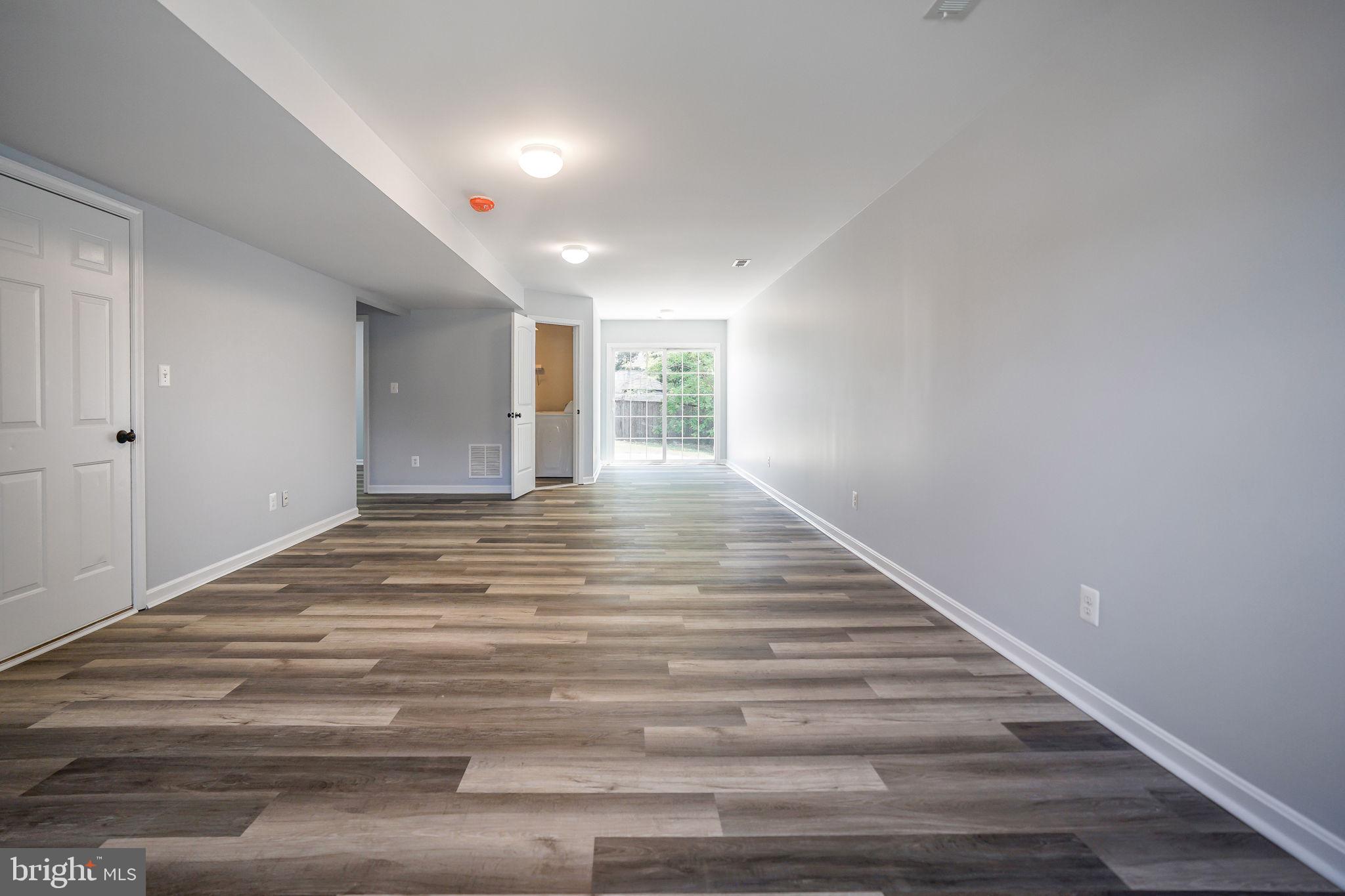 115 Meadow Road Pasadena, MD 21122 - Photo 53 of 77 Lower Level Family Room