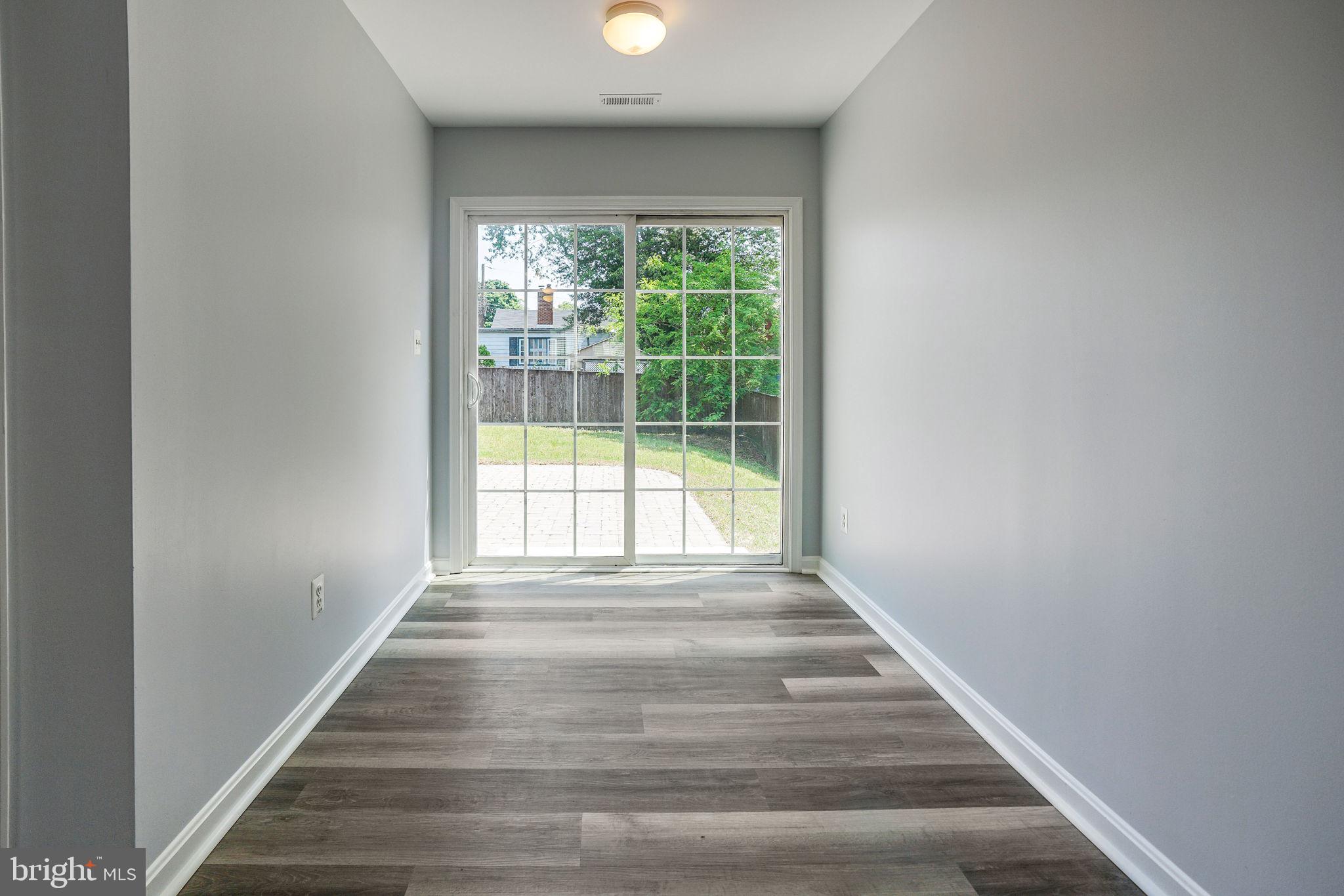 115 Meadow Road Pasadena, MD 21122 - Photo 56 of 77 Walkout to Patio